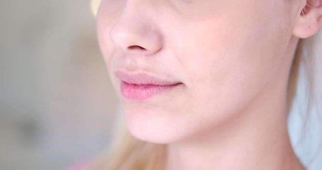 close-up portrait of a beautiful young blond woman