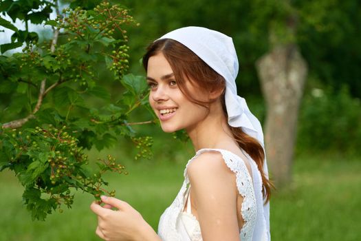 Woman in white dress countryside village nature ecology. High quality photo