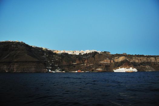 summer vacation on beautiful vulcanic island santorini at greece