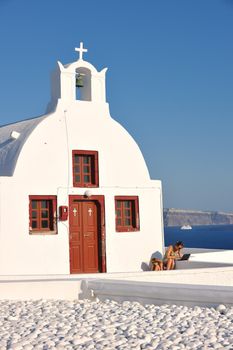 summer vacation on beautiful vulcanic island santorini at greece