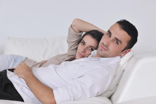 happy young couple relax at modern home living room indoor