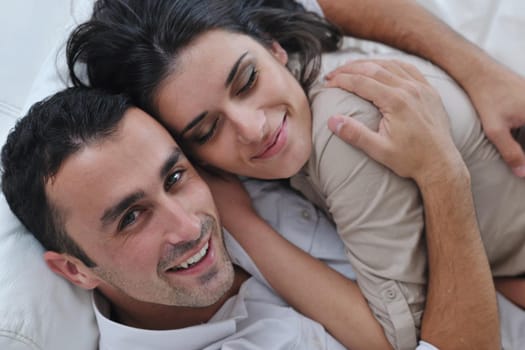 happy young couple relax at modern home living room indoor