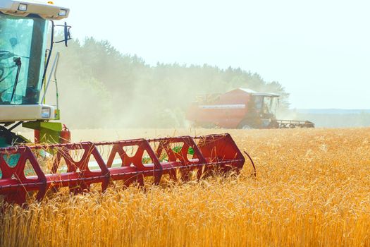 combine harvester working on a wheat field