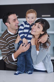 happy young family have fun and relaxing at new home with bright furniture