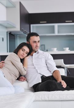 happy young couple relax at modern home living room indoor