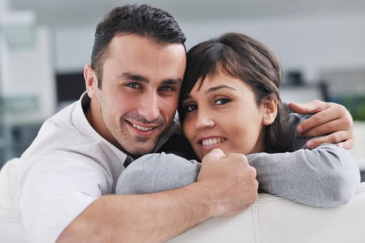 happy young couple relax at modern home living room indoor