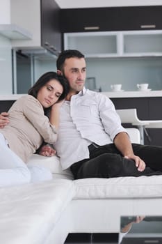 happy young couple relax at modern home living room indoor