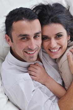 happy young couple relax at modern home living room indoor