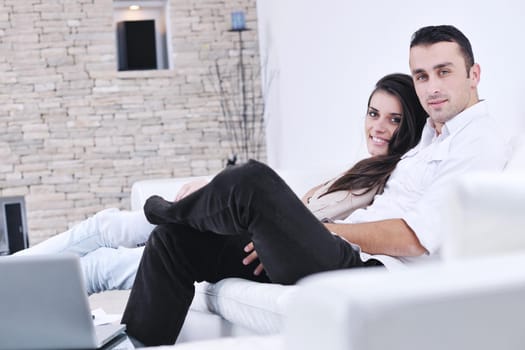 happy young couple relax at modern home living room indoor