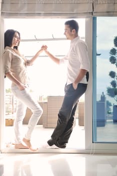 happy young couple relax at modern home living room indoor