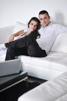 happy young couple relax at modern home living room indoor
