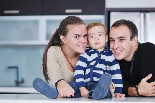 happy young family have fun and relaxing at new home with bright furniture