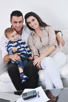 happy young family have fun and relaxing at new home with bright furniture