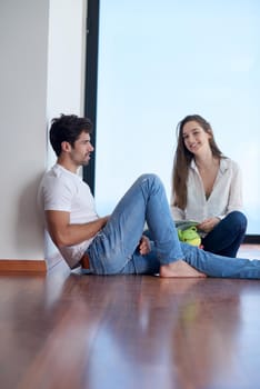 romantic happy young couple relax at modern home staircase indoors