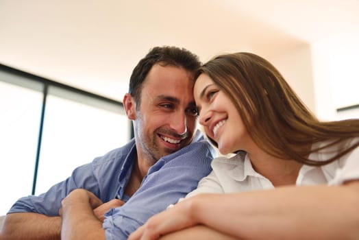 romantic happy young couple relax at modern home indoors