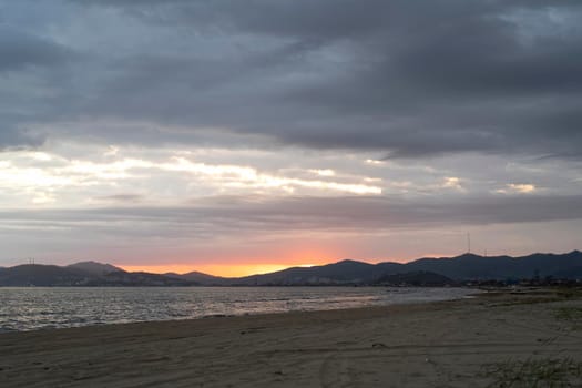 seascape with a beautiful sunset on the background of the sea.