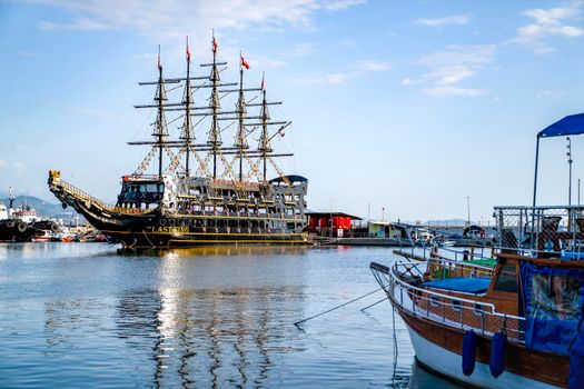 Turkey, Alanya - November 9, 2020: An old pirate ship is moored in the bay of Alanya. Bay of ships.