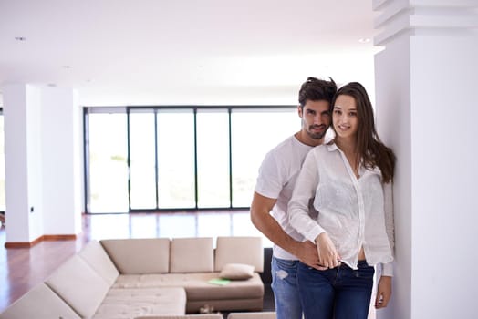 romantic happy young couple relax at modern bright  home  indoors