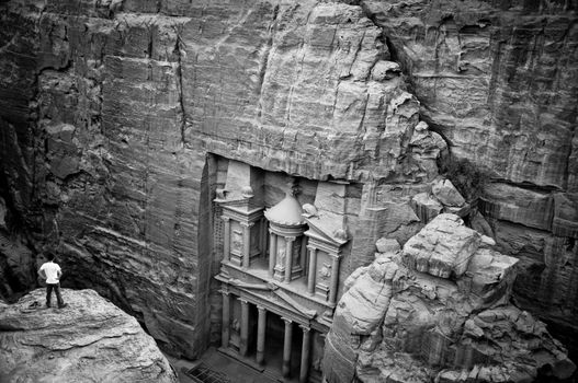 View of the red rose city of Petra from mountain, Treasury facade.