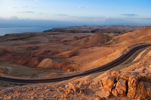 desert road waving in the mountains of Jordan near Dead Sea coast