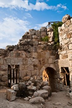 details of ancient castle of Ajlun in Jordan with blue  cloudy sky in background