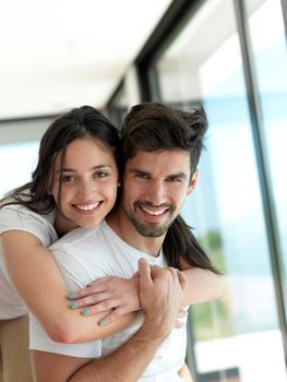 romantic happy young couple relax at modern home indoors and have fun