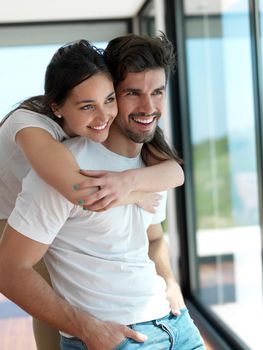 romantic happy young couple relax at modern home indoors and have fun