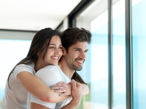 romantic happy young couple relax at modern home indoors and have fun