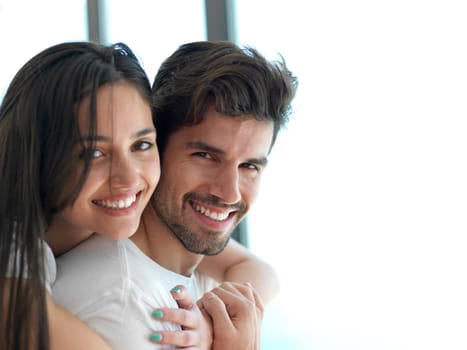 romantic happy young couple relax at modern home indoors and have fun