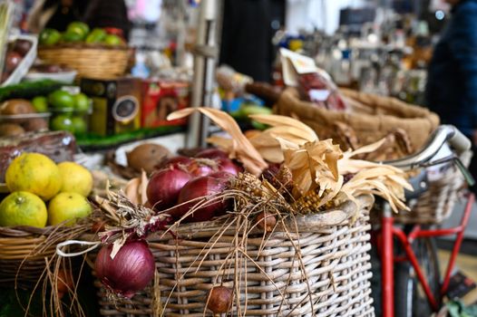 Onions in basket at a Roman market stall.