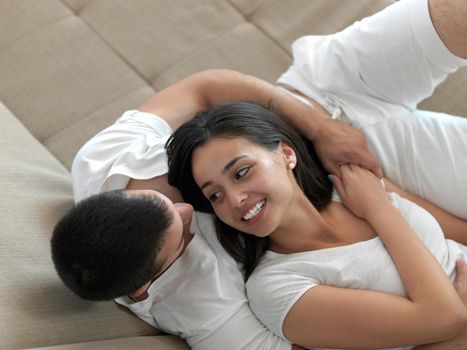 romantic happy young couple relax at modern home indoors and have fun