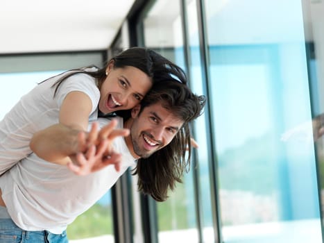 romantic happy young couple relax at modern home indoors and have fun