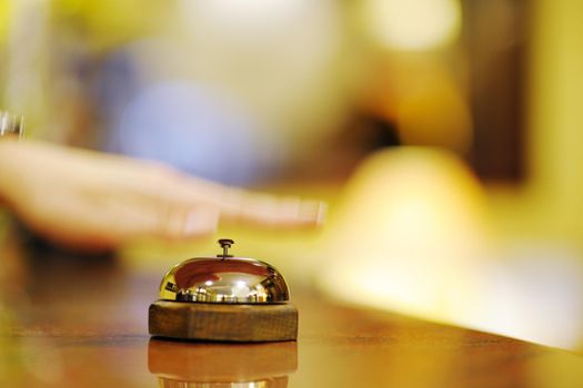 business woman  at the reception of a hotel checking in