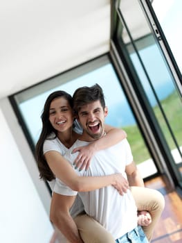 romantic happy young couple relax at modern home indoors and have fun