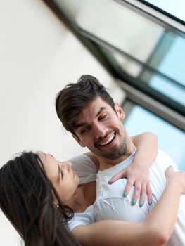 romantic happy young couple relax at modern home indoors and have fun