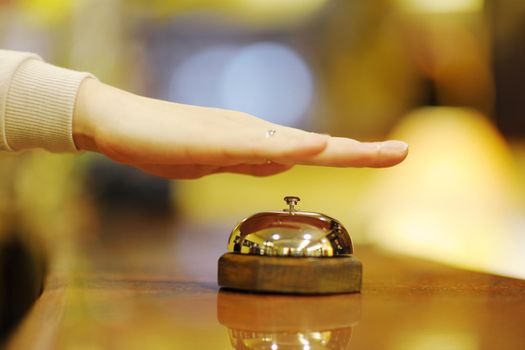 business woman  at the reception of a hotel checking in