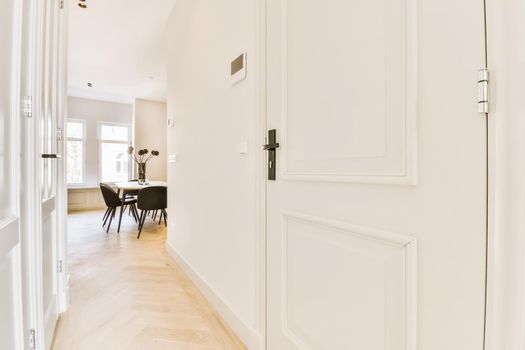 A long empty corridor designed in minimalistic style