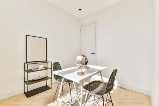 A cozy and spacious office room in a luxury design