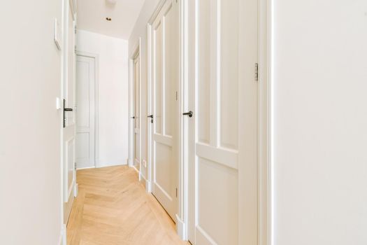 A long empty corridor designed in minimalistic style