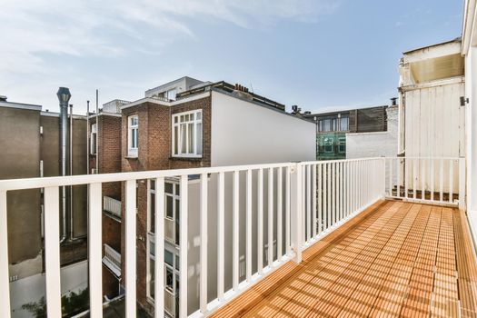 Long cozy balcony in a luxury house