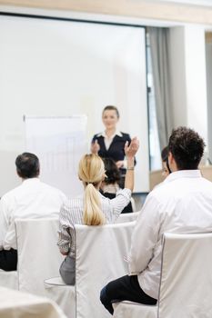 business people group at meeting seminar presentation in brigt conference room