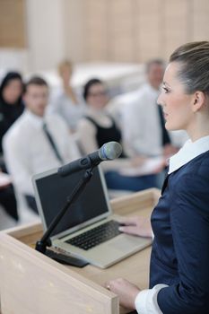 business people group at meeting seminar presentation in brigt conference room