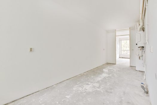 A long empty corridor designed in minimalistic style