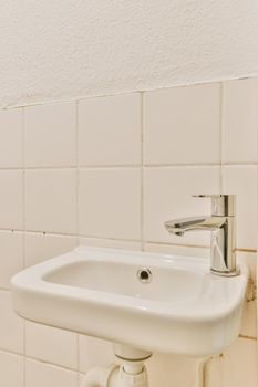 Close up of luxury faucet in an elegant bathroom