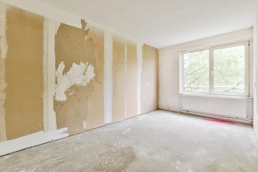 Interior design of a bright room with large windows