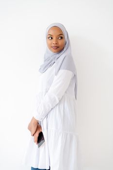 young modern muslim african business woman using smartphone wearing hijab clothes isolated on white background