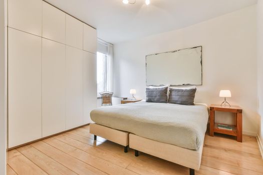 Interior of a cozy and bright bedroom with beautiful decoration