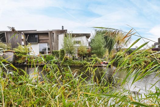 View of a gorgeous river with residential buildings
