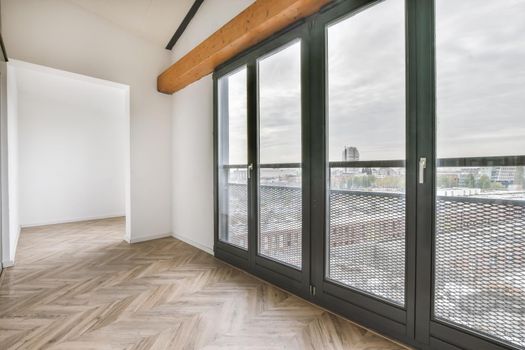 Spacious bright and pretty room with large windows and parquet floor