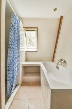 Bright elegant bathroom interior in a luxury house